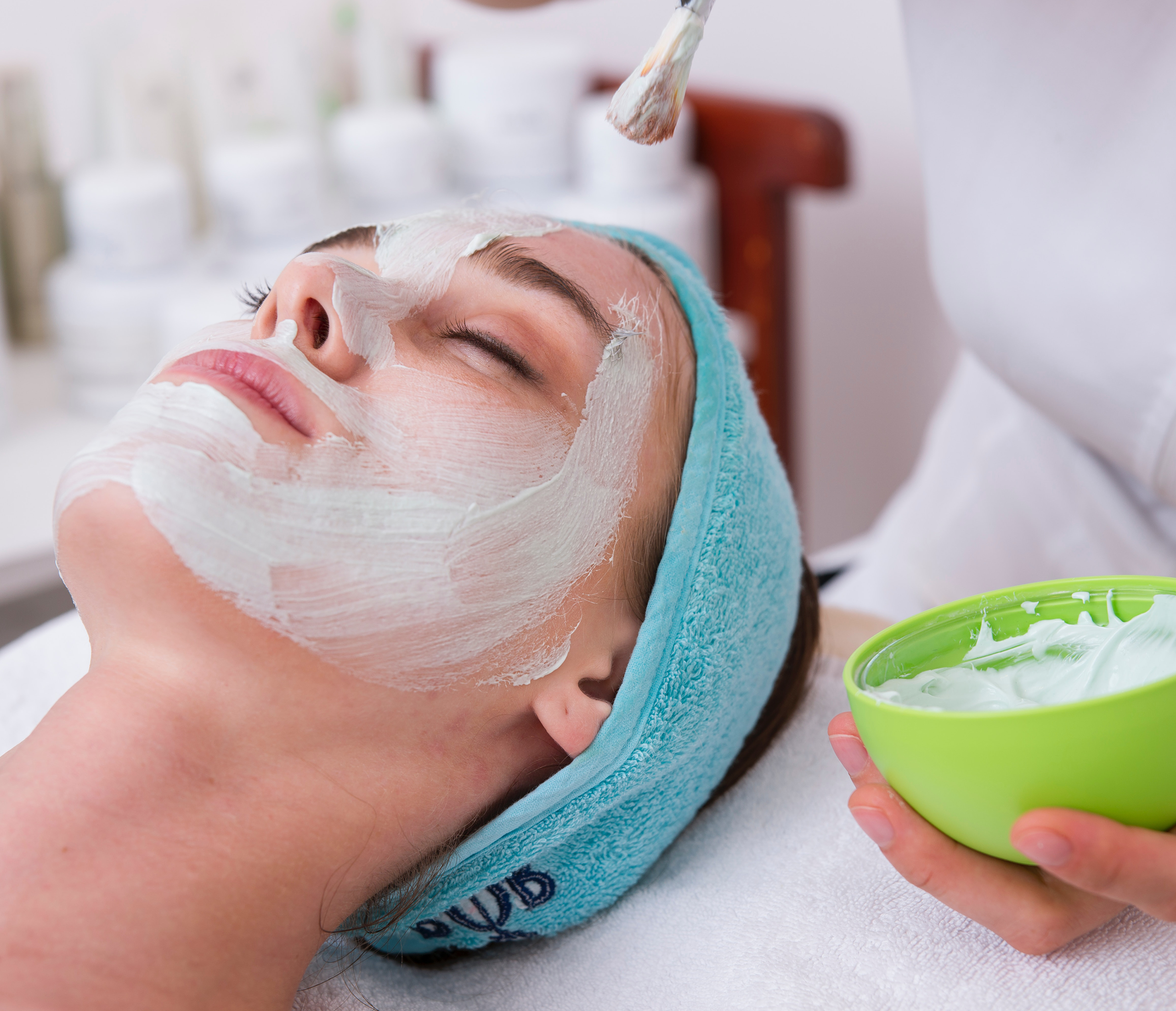 parkland-facial Woman receiving a facial treatment in a spa setting.